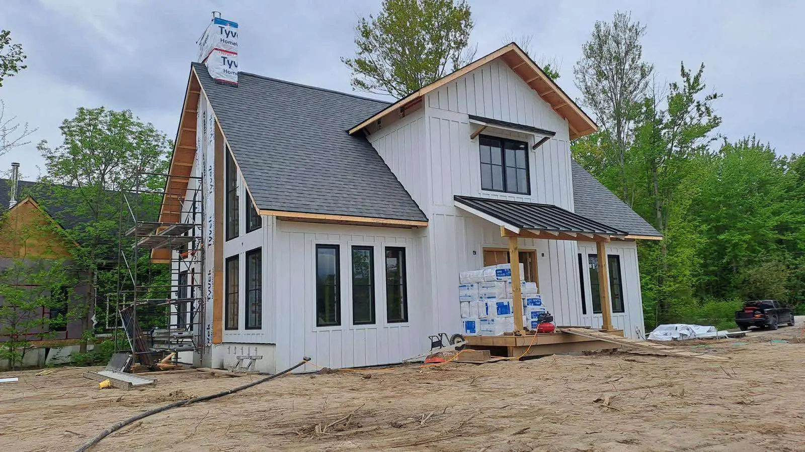 Newly built modern farmhouse-style home with board-and-batten siding